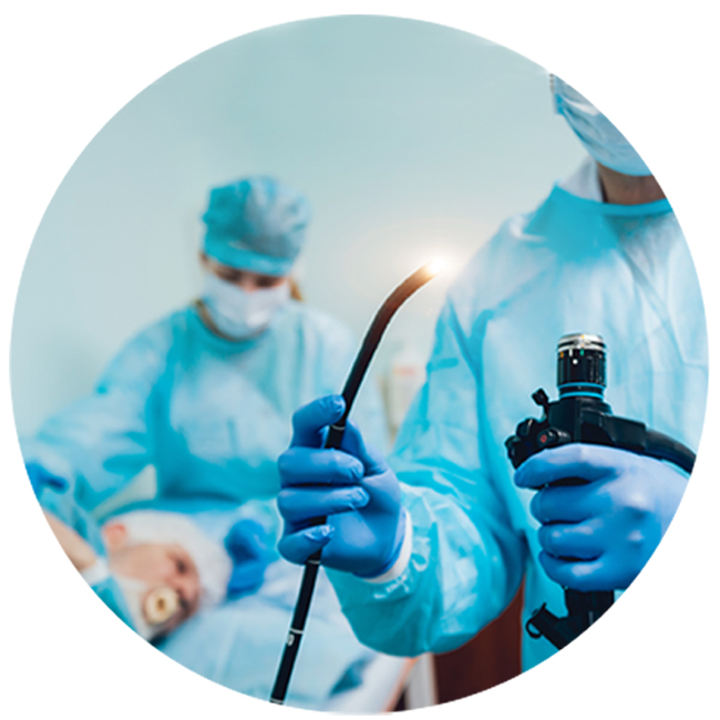 image of doctor holding endoscope